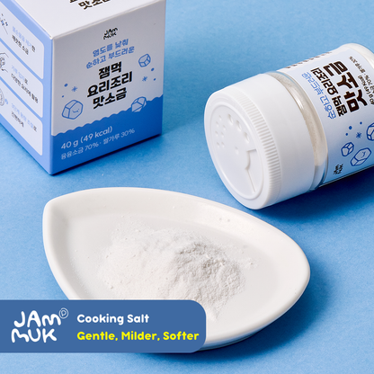 Jar of cooking salt with a scoop and packaging on a blue background, featuring the Jammuk brand.